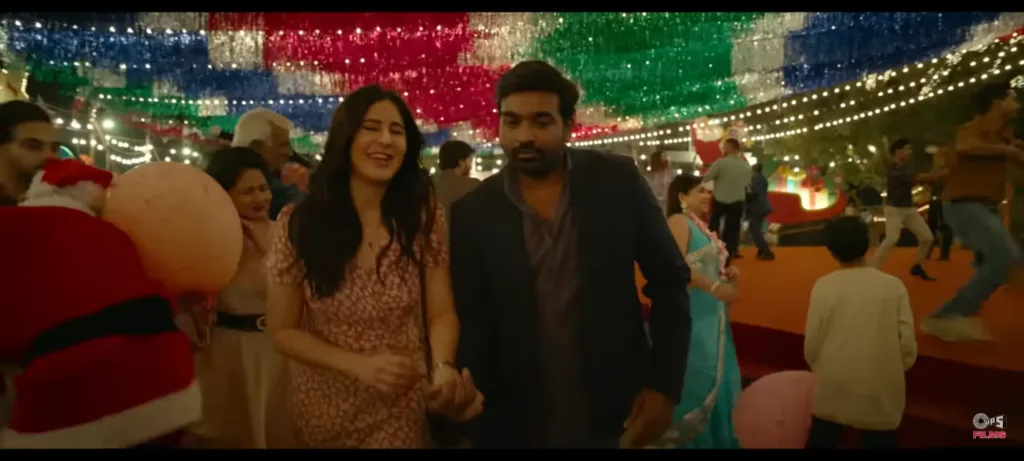 Katrina Kaif and Vijay Sethupathi in Merry Christmas, with Mumbai skyline in the background.